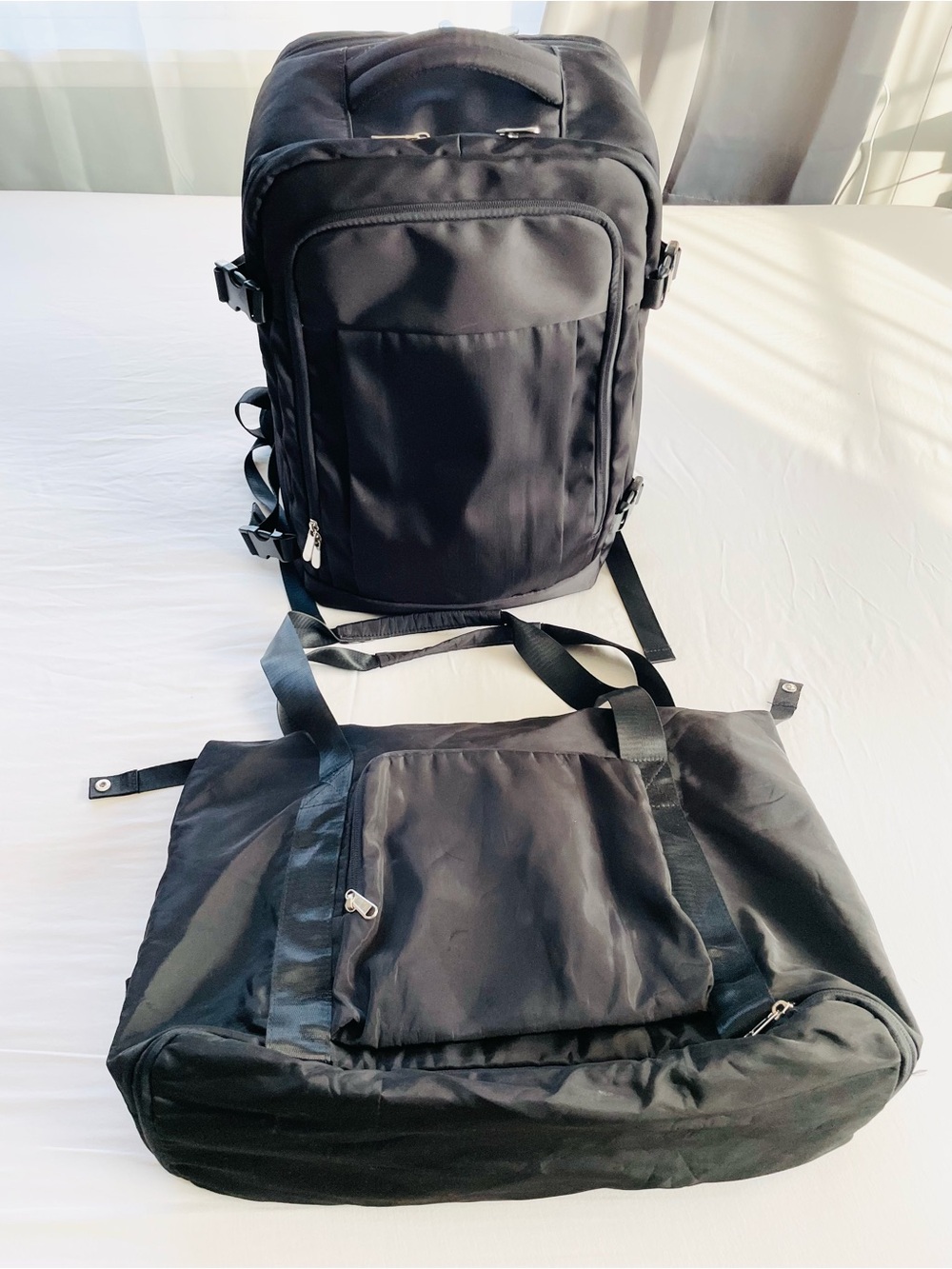 Black carry on travel bags set, 2 items total. Adjustable, spacious, lightweight